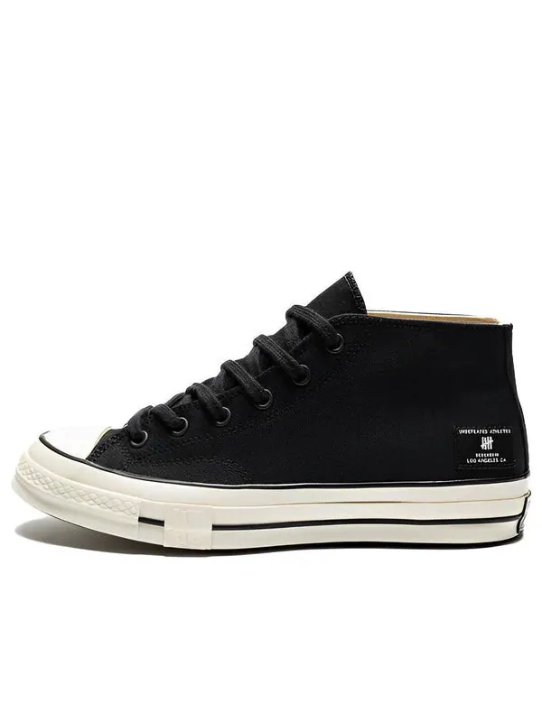 Кроссовки x undefeated 1970s mid 'black white' Converse — изображение 1 из 4, черный/белый