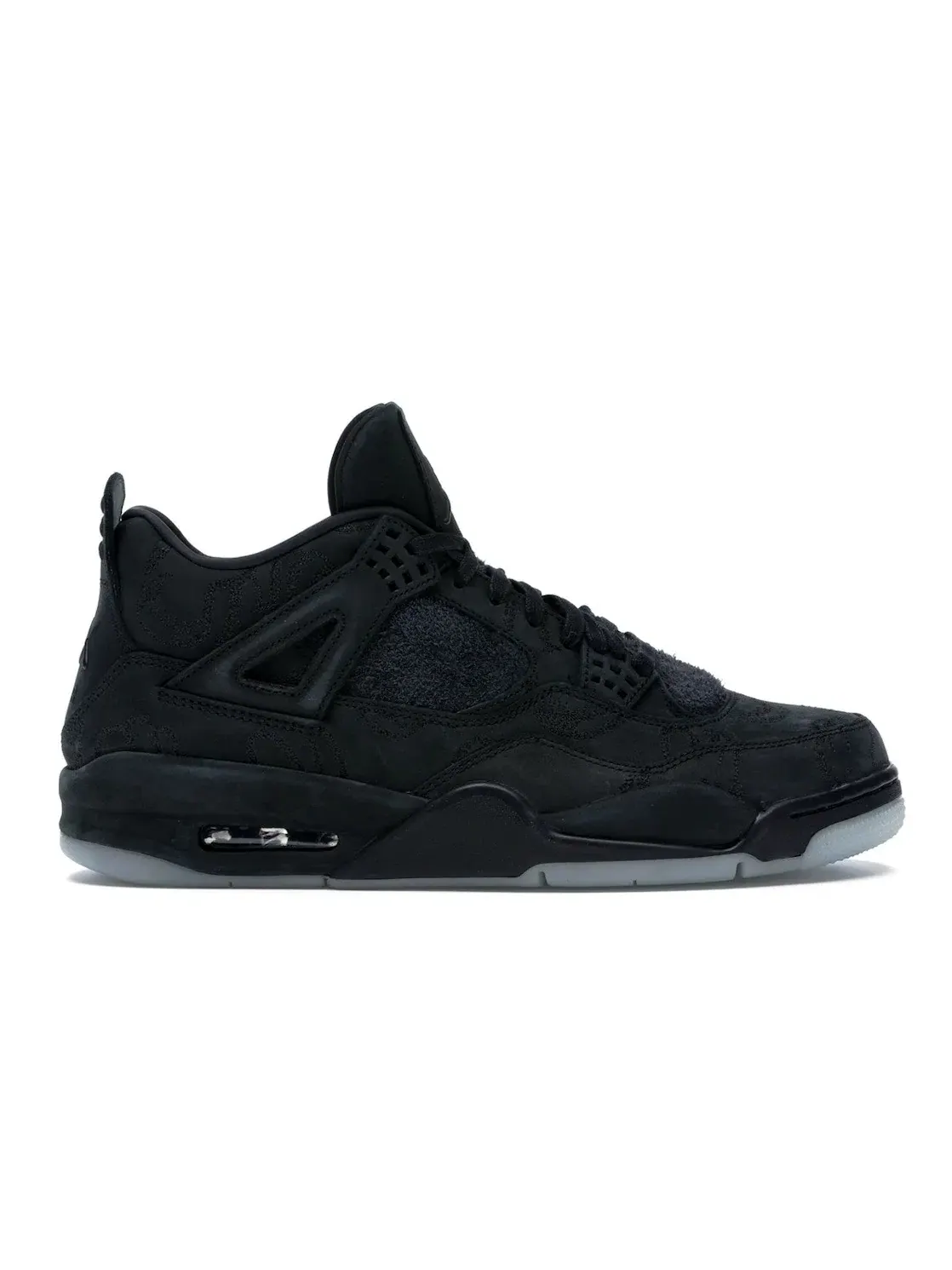Мужские кроссовки коллаборации Kaws Jordan 4 Retro Black/Black-Clear-Glow — изображение 1 из 4