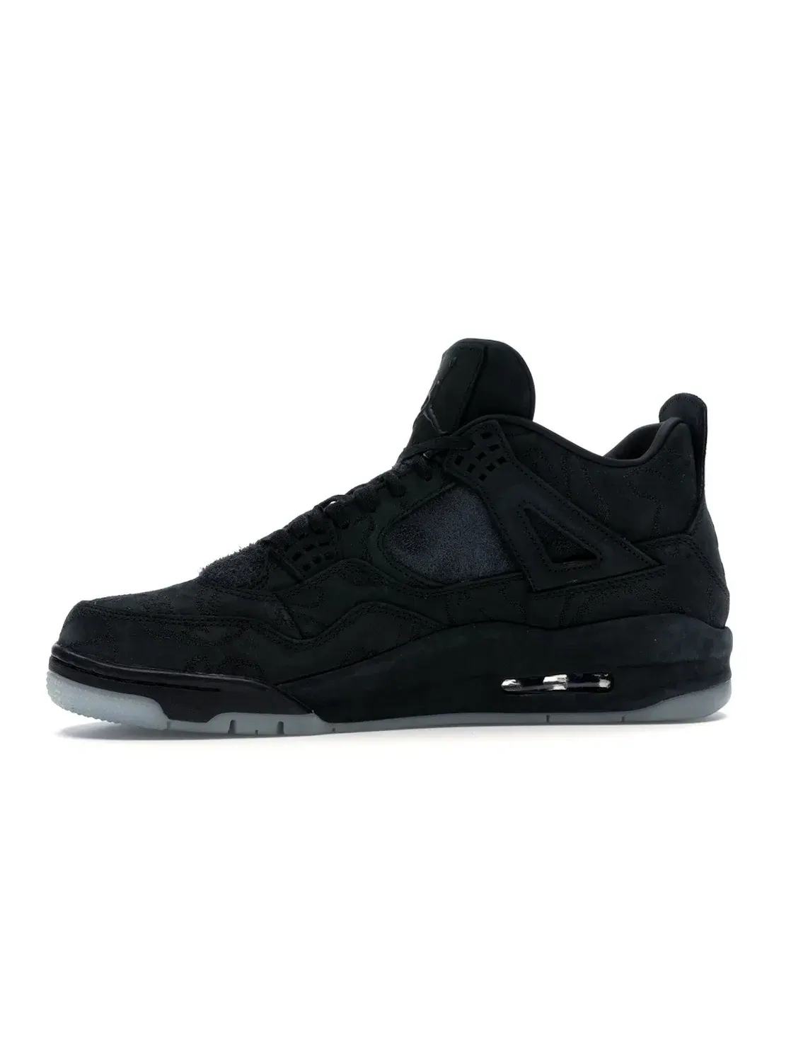 Мужские кроссовки коллаборации Kaws Jordan 4 Retro Black/Black-Clear-Glow — изображение 3 из 4