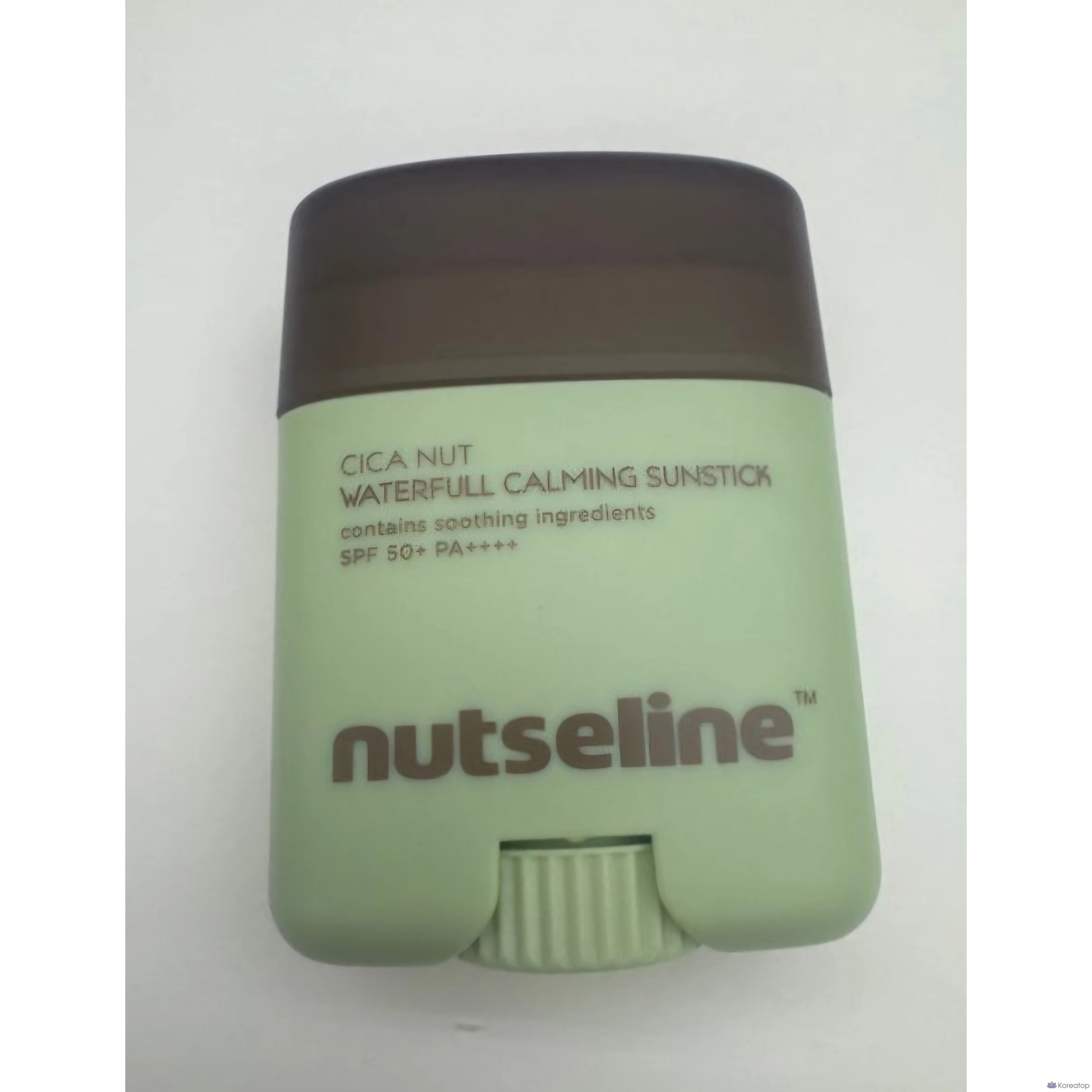 Солнцезащитный стик AHC Nutserine Cica Nut Sunstick Calming Cooling Watered SPF50+ PA++++, 18 г, 1 шт.