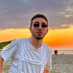 Николай