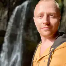 Николай