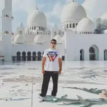 Али