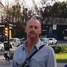 Николас