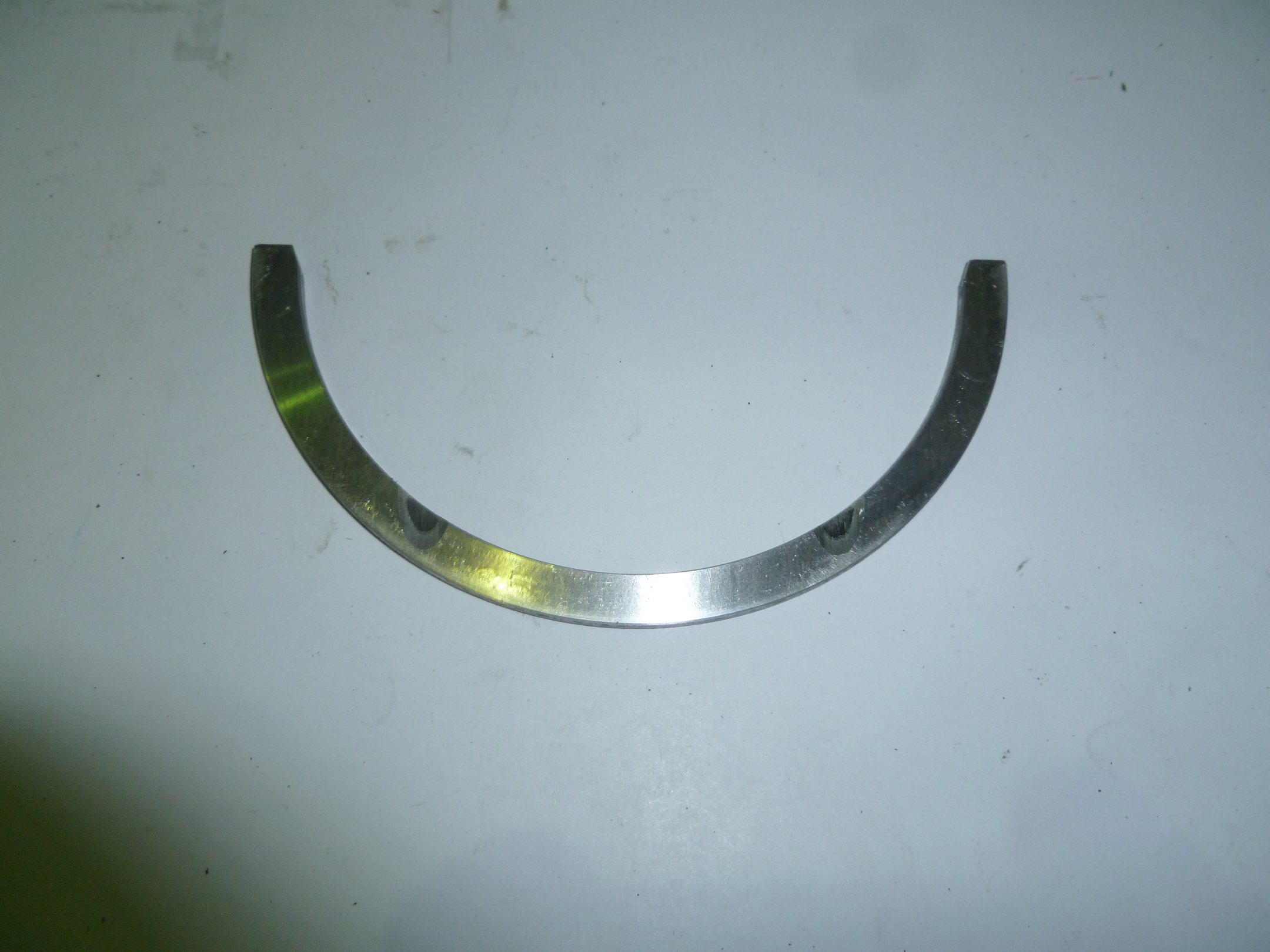 Полукольцо упорное вала коленчатого верхнее TDL 16-36 4L/Crankshaft thrust plate (upper)