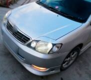 Реснички на фары для Toyota Corolla NZE 121 2000-2005 (седан)