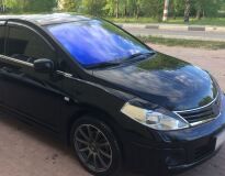 Накладки на передние фары (реснички) Nissan Tiida 2008-2014 (хэтчбек) B3-5
