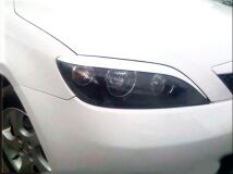 Реснички на фары для Mazda 2, Demio 2002-